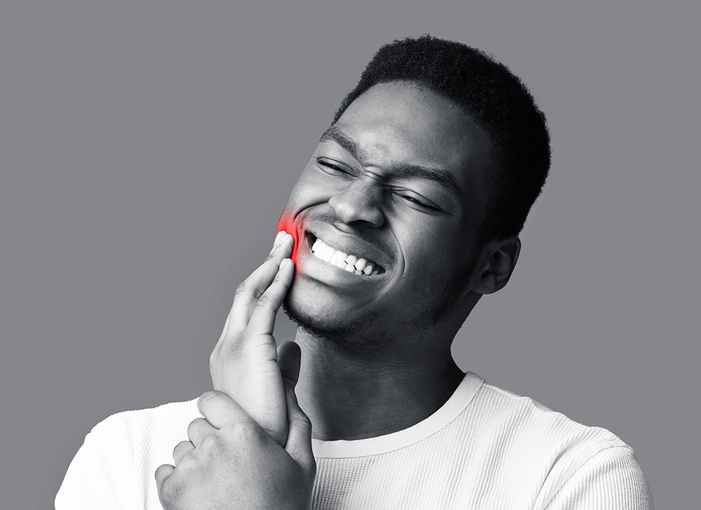 Man with jaw pain requiring tmj treatment